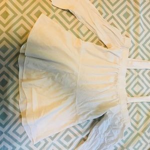 This is a cute white off shoulder shirt.